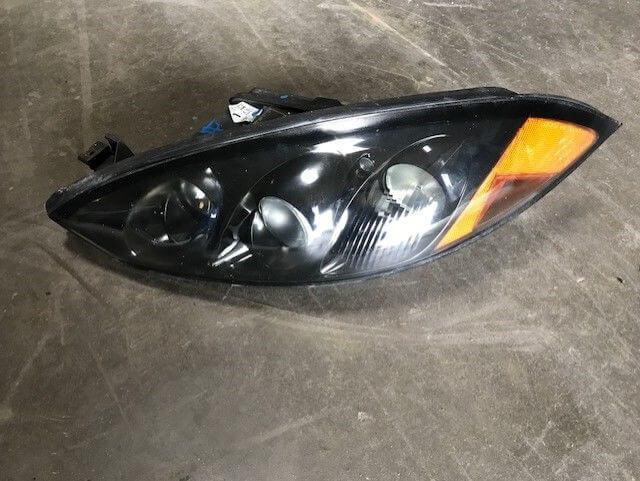 Used OEM 99 00 MERCURY COUGAR HEADLIGHT LEFT SIDE A GRADE OEM
