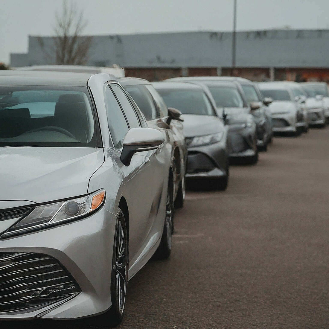 Line of Toyota cars highlighting used Toyota parts available at GreenGears Auto Limited for savings and sustainability.