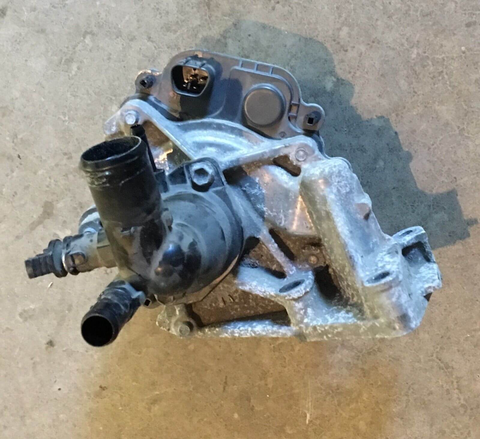 Used OEM 2012-2014 Toyota Prius C 1.5L Water Pump W/ Coolant Thermostat Housing