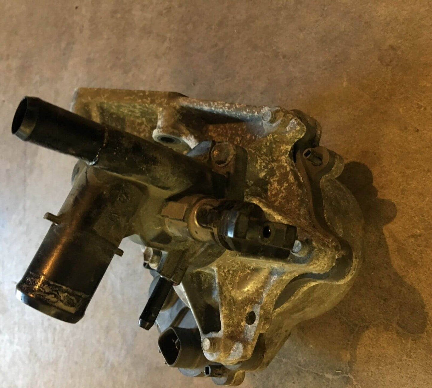 Used OEM 2012-2014 Toyota Prius C 1.5L Water Pump W/ Coolant Thermostat Housing