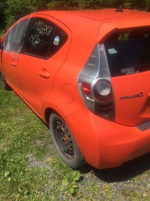 Used OEM 2012-2015 Toyota Prius C Seat belt tensioner front driver side